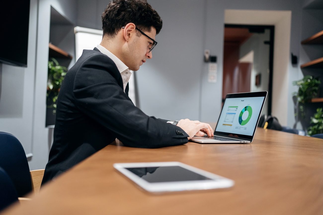 An executive reviewing benefits data