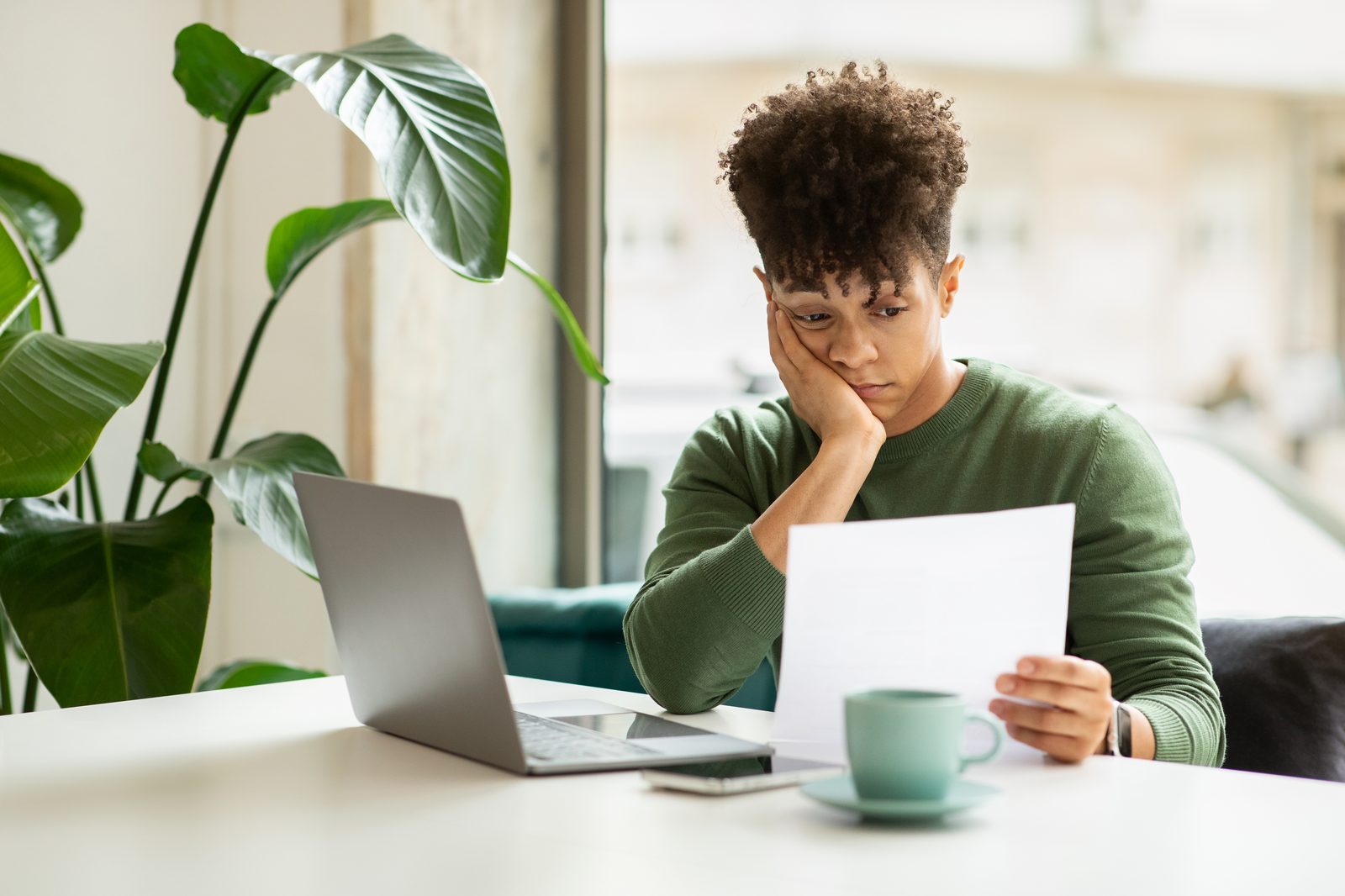 An employee working through benefits paperwork